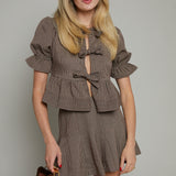 Sutton Plaid Bow Front Peplum Top